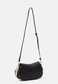 Tommy Hilfiger HERITAGE SADDLE BAG - Käekott - black