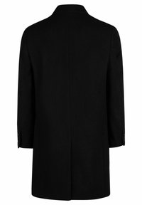 Svart kappa med en rak silhuett, långa ärmar och slagkrage. Har knappdetaljer på ärmsluten och en slits bak.