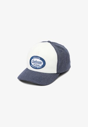 Gorra azul y blanca con forma estructurada, que presenta una textura de mezclilla, parche de logo en la parte frontal y visera curvada. Tejido de mezcla de algodón.