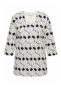 Haut blanc avec un motif géométrique en coquillage marine, décolleté en V et manches trois-quarts. Fabriqué à partir d'un tissu lisse au toucher doux.