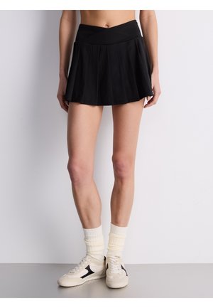 - Spódnica trapezowa