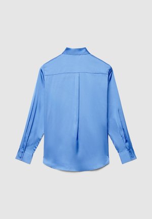 Long-sleeve light blue satin shirt with buttoned cuffs, back yoke seam, and center pleat, displayed on a plain light gray background.
