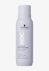 Schwarzkopf Blondme Purple Conditioner i en hög, vit, matt flaska med silvertext. Innehåller detaljer för att neutralisera gula undertoner.