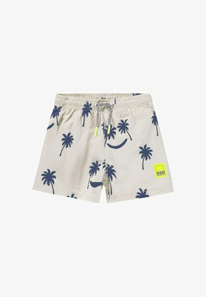 Shorts de bain beiges avec imprimé de palmiers bleu marine, taille élastique avec cordon de serrage, et un écusson logo jaune néon à l'avant.