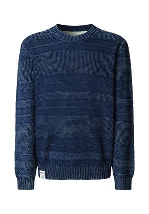 Maglione in maglia blu navy con motivi geometrici strutturati, collo a girocollo a coste, polsini e orlo, con una piccola etichetta bianca sul fondo.