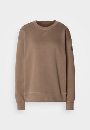 Sweatshirt de fleece castanho com mangas longas, decote redondo e detalhes de costura discretos. Apresenta um pequeno rótulo da marca na manga esquerda.
