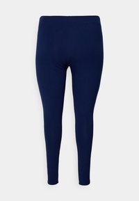 Námornícky modré legíny vyrobené z elastického materiálu, s hladkou textúrou a priliehavým strihom so elastickým pásom. Žiadne viditeľné kovové prvky.