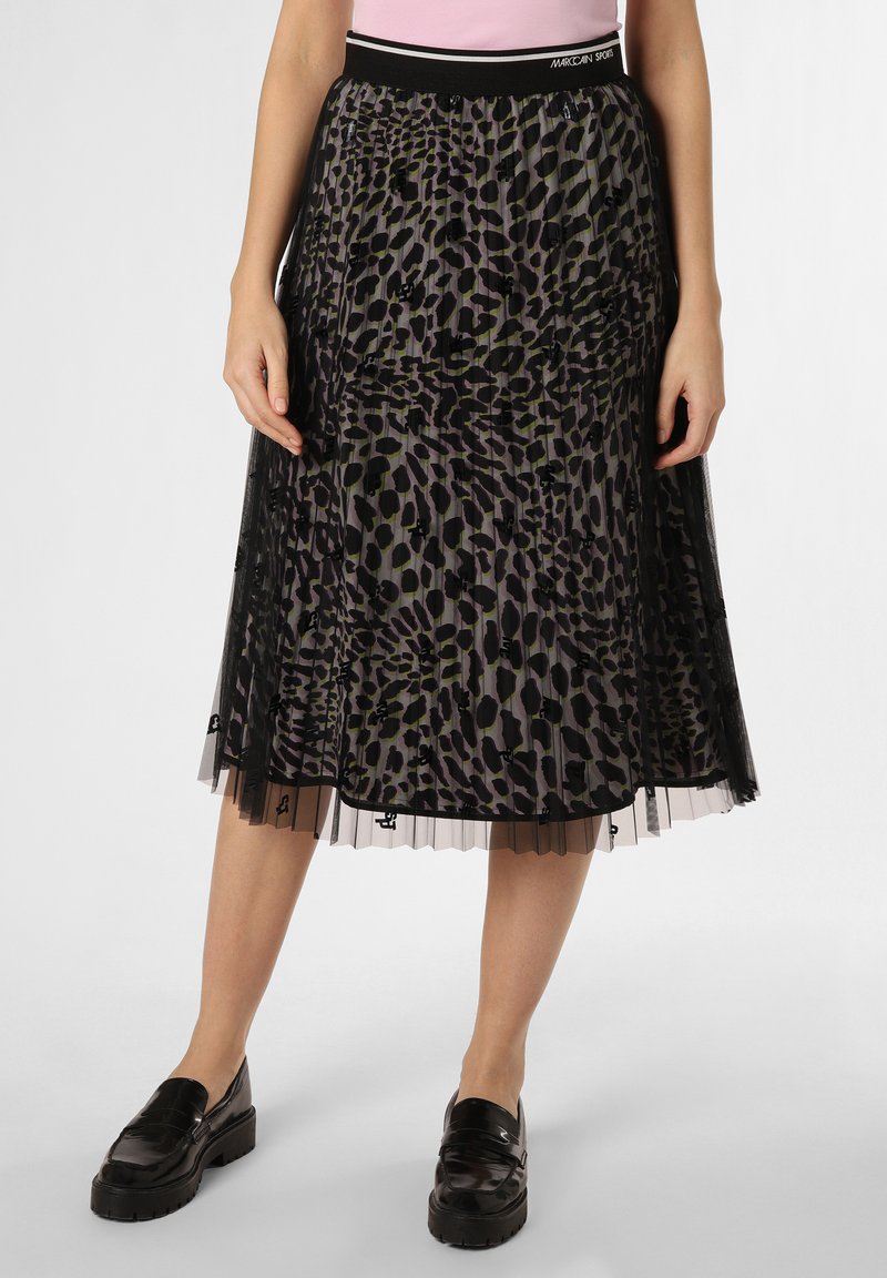 Schwarz transparente plissierte Skirt mit Leopardenmuster in Grün und Lila. Elastischer Bund mit Logo-Detail. Glatte Innenauskleidung.