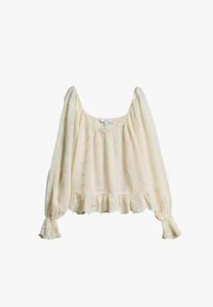 Krémová blúzka s dlhými rukávmi a nadýchanými rukávmi, jemnou kvetinovou výšivkou, čipkovou lemovkou na manžetách a spodnom okraji, a širokým okrúhlym výstrihom.