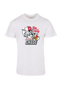 Hvit bomulls t-skjorte med grafisk trykk av Tom og Jerry, med fet svart og rød tekst og et lekent design foran.