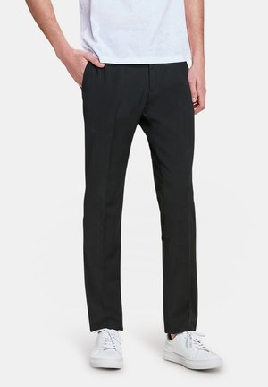 SLIM FIT - Kostymbyxor - black