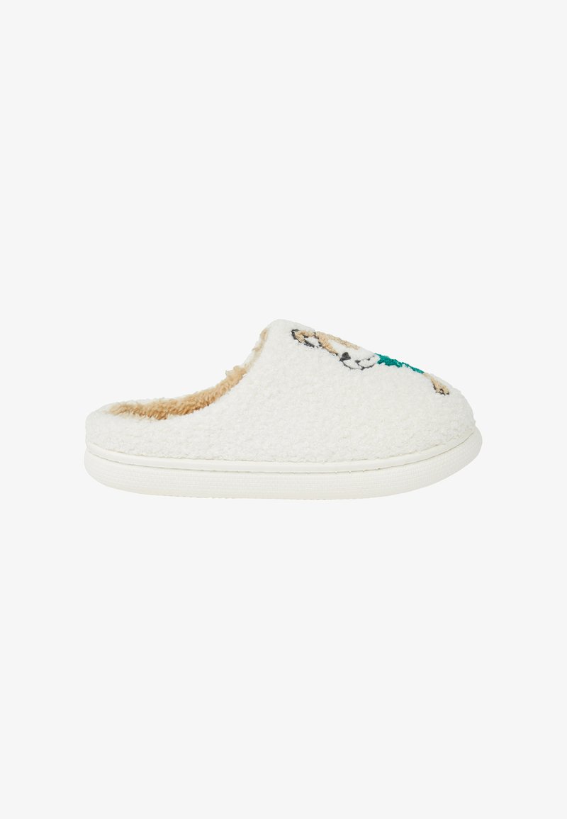 Pantofole bianche con tessuto peloso e testurizzato e fodera beige. Presenta un design con animale dei cartoni animati sulla parte superiore. Suola morbida e forma arrotondata.
