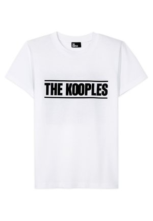 White cotton t-shirt featuring a black graphic print of "THE KOOPLES" in bold, centered text. Classic crew neckline and short sleeves.