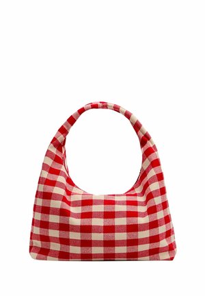 Sac à main en tissu à carreaux rouges et blancs avec une anse arrondie et un corps rectangulaire sur fond blanc.
