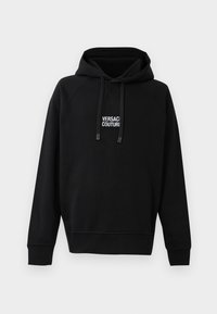 Čierna mikina s kapucňou vyrobená z bavlnenej zmesi. Obsahuje prednú kapsu, kapucňu so šnúrkami a biele logo "VERSACE COUTURE" na hrudi.