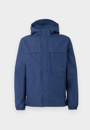 Navy blue waterproof jacket with a hood, two chest pockets, and elastic cuffs. Smooth texture with stitched detailing and brand logo.