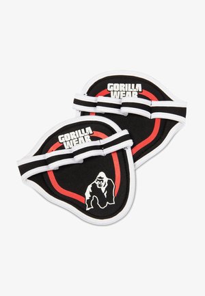 Zwarte stoffen hefbanden met witte en rode accenten, voorzien van vetgedrukte "GORILLA WEAR"-tekst en een gorilla-afbeelding op een gestructureerd oppervlak.