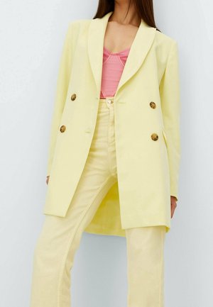 Halflange jas - yellow