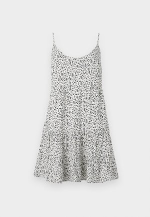 Λευκό αμάνικο καλοκαιρινό φόρεμα με λεπτές τιράντες, μικρό μαύρο floral σχέδιο και φούστα με στρώσεις.