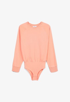 Bodysuit à manches longues raglan en coton doux pêche. Doté d'un col côtelé, de poignets ajustés et d'une fermeture à boutons-pression en bas. Texture lisse.