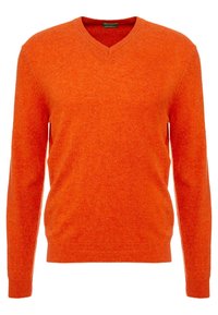 V-ringad tröja i starkt orange, gjord av mjukt, texturerat tyg. Långa ärmar med en figurnära silhuett, minimalistisk design utan utsmyckningar.