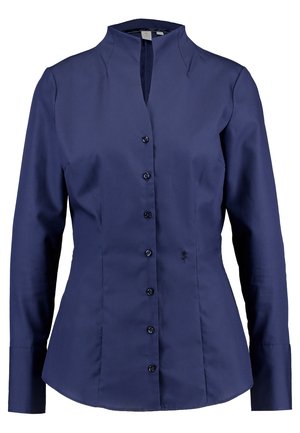 Camicia a maniche lunghe blu navy con colletto alla mandarino, dotata di chiusura a bottoni e dettagli ricamati sottili all'orlo. Tessuto morbido e lucido.