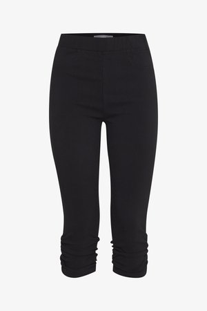 Mustad lühikesed retuusid, millel on kokkupandud sääreotsad ja elastne vöökoht, loodud tiheda ja mugava sobivuse tagamiseks.