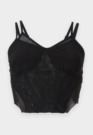 Μαύρο cropped τοπ από διχτυωτό ύφασμα με διπλούς ρυθμιζόμενους ιμάντες στους ώμους και δομημένα πάνελ στο στήθος.