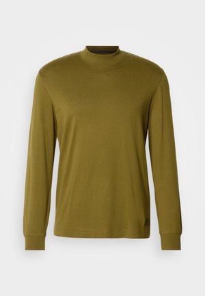 Olive green long-sleeve turtleneck shirt made of soft fabric, featuring a fitted design and ribbed neck and cuffs.