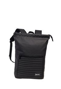 Black nylon backpack with a smooth finish, featuring a zippered front pocket with horizontal ribbed texture and adjustable shoulder straps.