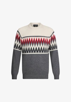 Vyriškas apvalaus kaklo megztinis su raudonu, pilku, juodu ir baltu zigzago raštu per krūtinę ir viršutines rankoves, o apatinė dalis ir rankovės yra vienodos pilkos spalvos.