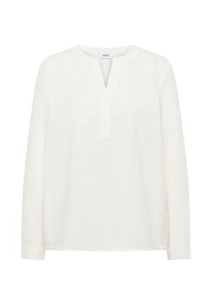 Biała bluzka z długim rękawem, okrągłym dekoltem i przednim rozcięciem, wykonana z fakturowanej tkaniny, z metką "CECIL" wewnątrz kołnierza.