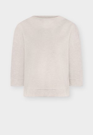 Svetlo bež široka majica sa zaobljenim izrezom i rukavima do tri četvrtine. Mekana tekstura, bez vidljivih uzoraka ili detalja. Prikaz sa stražnje strane.