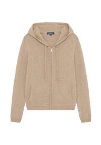 Sudadera con capucha beis, con cierre y manga larga, bolsillos frontales y cordones. Tejido suave con una textura lisa y un diseño informal.