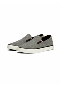 Gray slip-on shoes with textured fabric, elastic side panels, black inner lining, and a white sole with a black accent stripe.