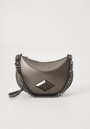 Metallic gray crossbody bag with a half-moon shape, featuring a chain strap and a diamond logo patch. Smooth finish and zipper closure.