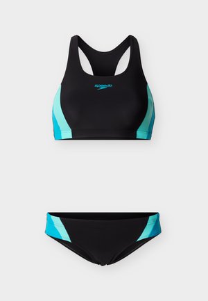 Sort og blå to-delt Speedo badedragt med racerback-top og matchende bikiniunderdel, med lyseblå sideaccenter.