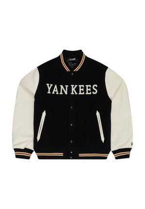 Black and cream varsity jacket with "YANKEES" text. Features ribbed collar, snap buttons, side pockets, and contrasting striped cuffs.