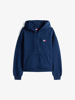 Tumedat sinise värvusega puuvillase segumaterjaliga kapuutsiga sviiter, millel on esine tasku ja reguleeritav kapuuts. Rinnal on väike logo kleebis.