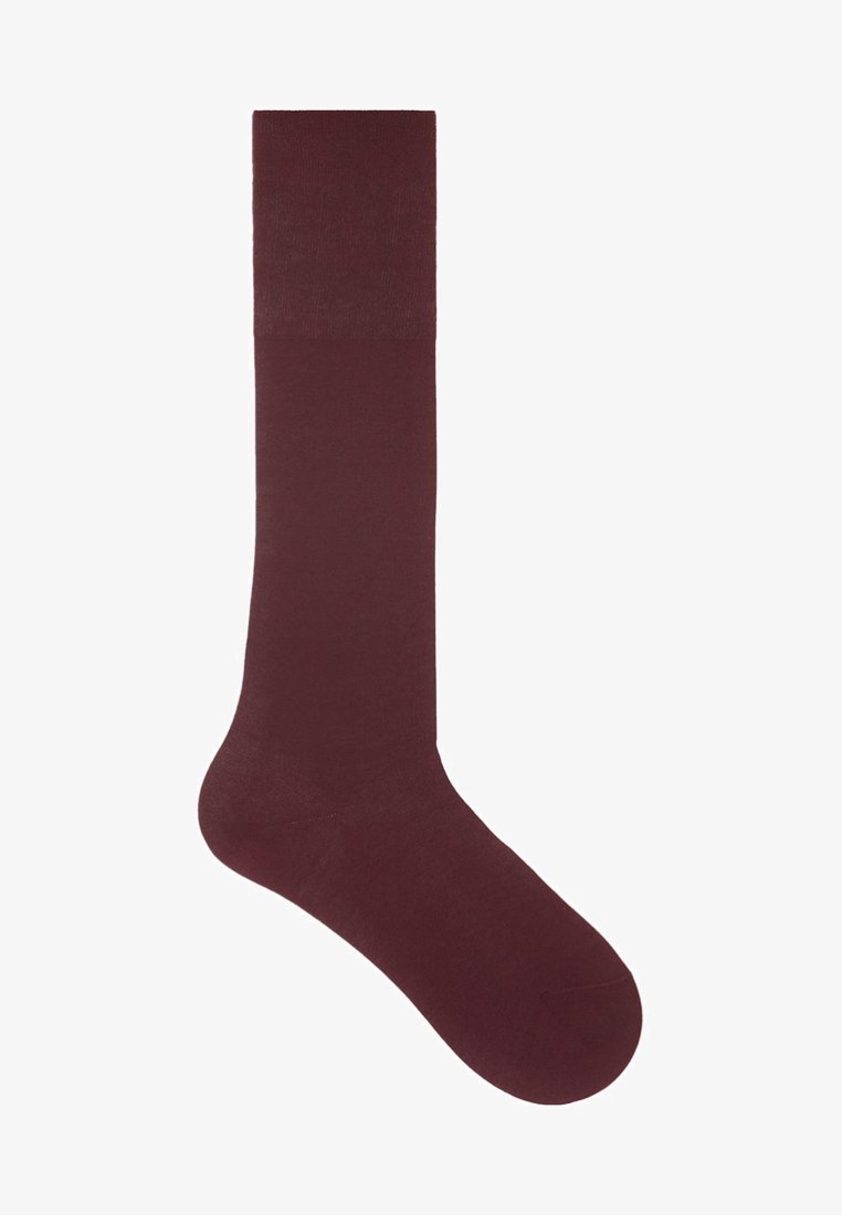 Single dark brown knee-high sock with a ribbed cuff, smooth texture, and rounded toe on a white background.