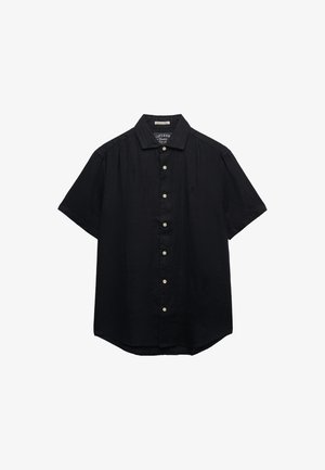 Camicia nera a maniche corte con bottoni bianchi e colletto classico, mostrata stesa su uno sfondo bianco.