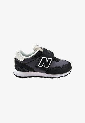 Sneaker nere e grigie con tomaia in mesh e suede, cinturino in velcro e suola intermedia bianca a contrasto. Presenta il logo sul lato e una suola testurizzata.