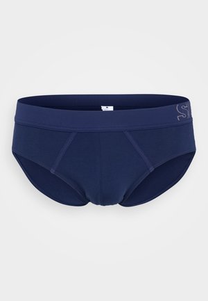 Culotte pour homme bleu marine en tissu doux, dotée d'une large ceinture élastique avec un branding subtil, d'un design élégant et d'une texture lisse.
