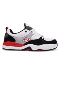 Black, white, and red sneakers with a mesh and suede upper. Thick rubber sole, padded collar, and cushioned tongue. Features logo on the side.