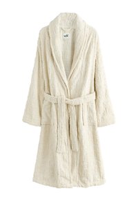 Peignoir couleur crème en tissu texturé et moelleux avec un motif répétitif « self. », col châle et ceinture assortie.