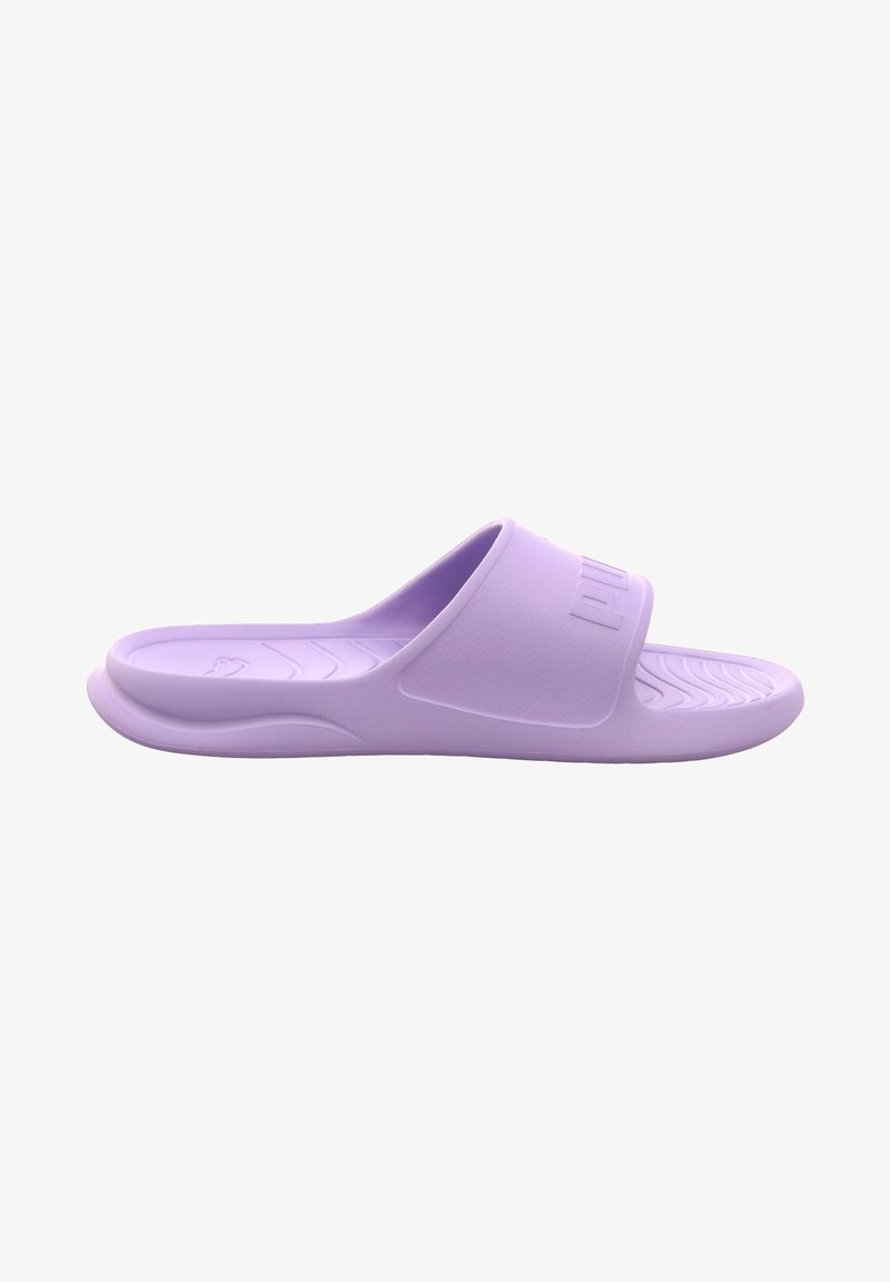 Light purple slide sandal with a textured footbed and smooth upper strap. The brand logo is embossed on the strap. Soft, flexible material.