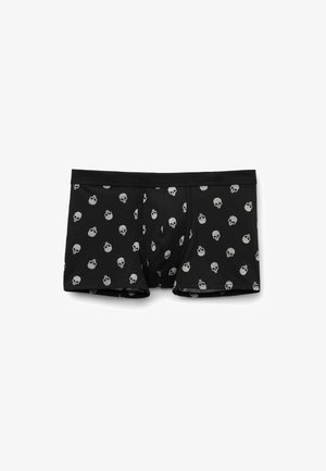 Czarne majtki bokserskie z rozsianymi małymi białymi wzorami czaszek, elastycznym pasem oraz szczegółem w postaci rozkroku, ułożone na białym tle.
