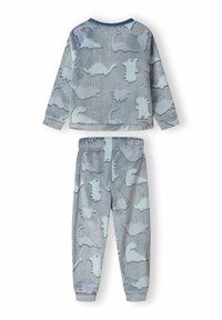 Ensemble de pyjama en polaire doux et léger de couleur bleu clair avec un motif de dinosaure. Haut à manches longues avec un pantalon à taille élastique assorti. Texture confortable.
