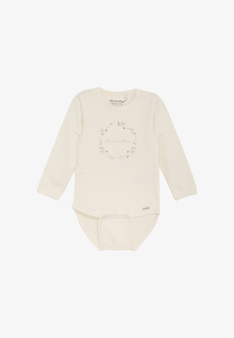 Body à manches longues en crème, fabriqué en coton biologique ; il présente un design de couronne florale avec le texte "Fleur en Éclosion" au centre.