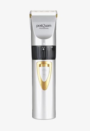 Tondeuse électrique professionnelle en argent et or avec cadran noir réglable pour les réglages de la longueur de la lame et un interrupteur d'alimentation.